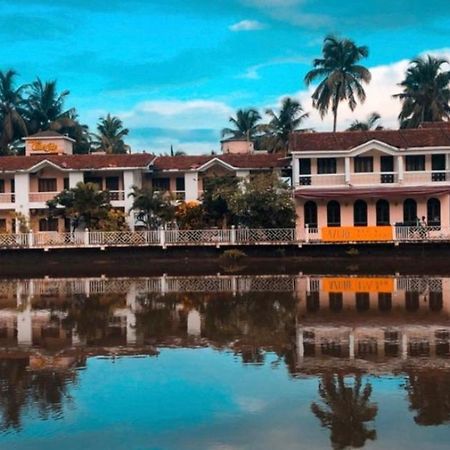 Hotel Riverside Baga Bagian luar foto