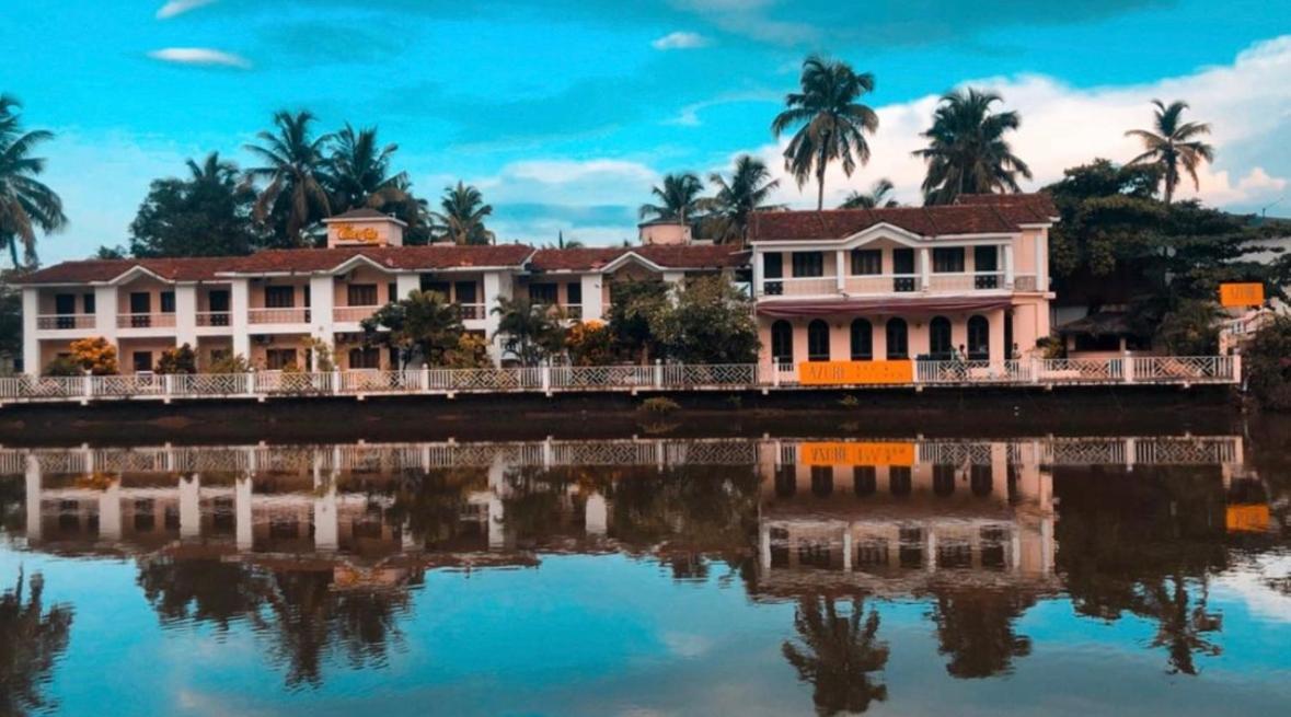 Hotel Riverside Baga Bagian luar foto