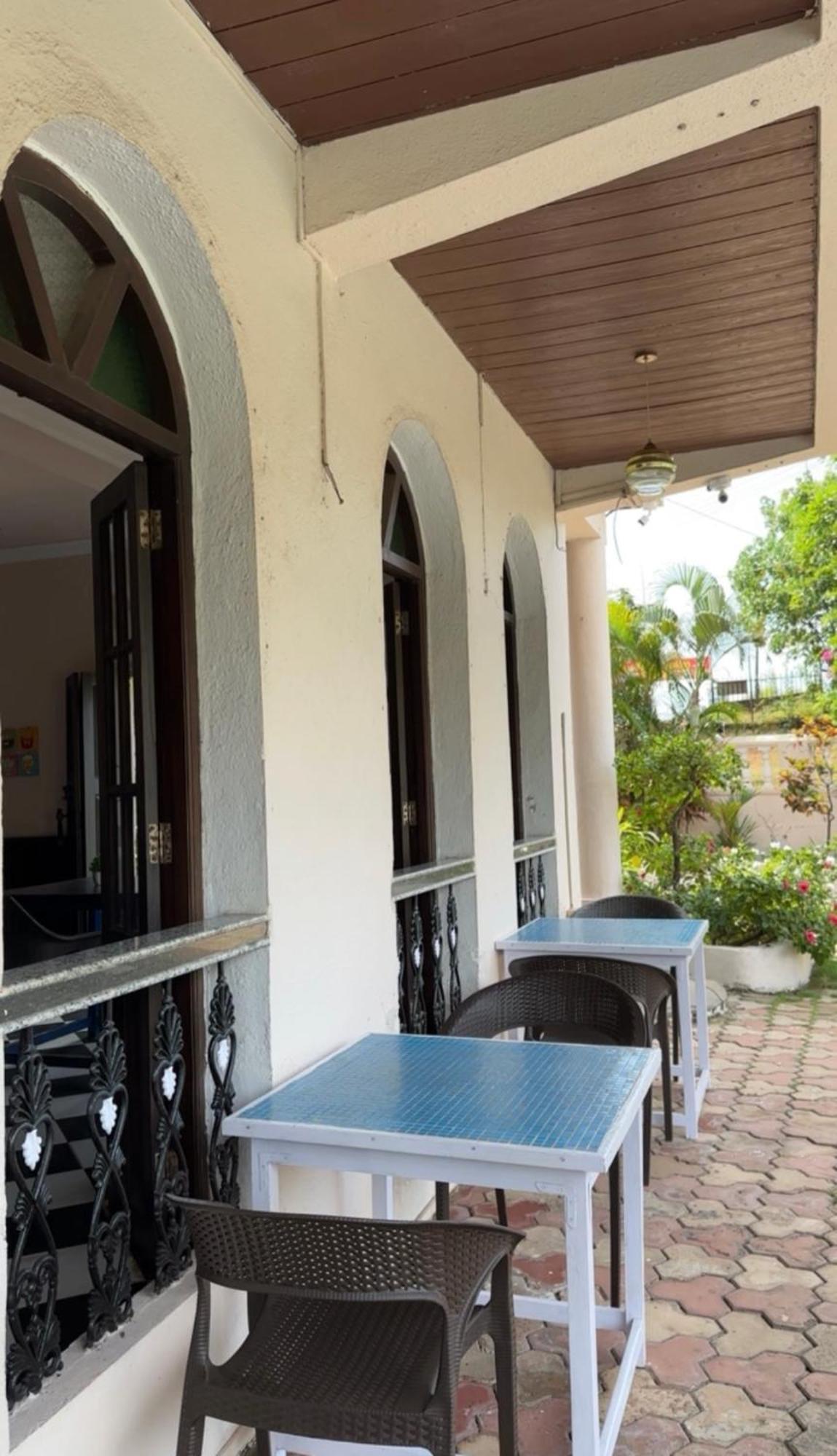 Hotel Riverside Baga Bagian luar foto